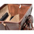 This is the top of a dark brown leather briefcase that is wide open so lawyers can get things out.