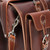 This is the front pocket upclose of the red brown leather briefcase for lawyers.
