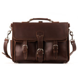 This red brown leather briefcase is 17 inches wide and has two front pockets on it.