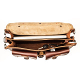This is the light tan suede interior of a leather briefcase