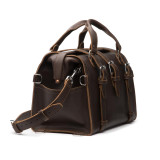 This is the dark brown leather overnight duffle bag from the side.
