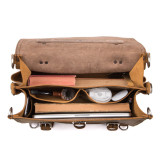 This is the interior of a light tan brown full grain leather briefcase with two gussets.