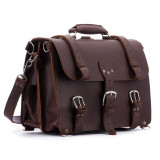 This red brown full grain leather briefcase has two straps on the sides and one in the middle.