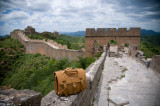 This is a full grain leather briefcase on the Great Wall of China.