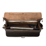 This is the interior of a dark brown slim leather briefcase with a light tan suede interior.