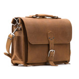 This is a tan brown leather briefcase with a flap over the front.