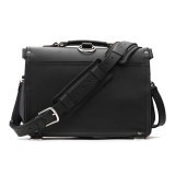 This is the back of a black slim leather briefcase with the strap behind it.