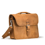 This is the front of a slim tan brown leather briefcase slightly angled.