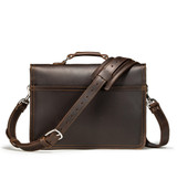 This is a slim dark brown leather briefcase turned away from the camera.