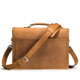 This is the back of a tan brown leather briefcase that is slim and easy to carry