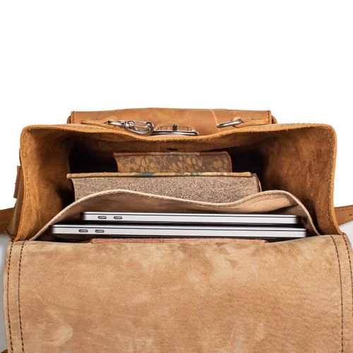 The inside of the thin front pocket leather backpack is great for laptops and other gear.