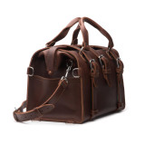 This is the red brown leather overnight duffle bag from the side.