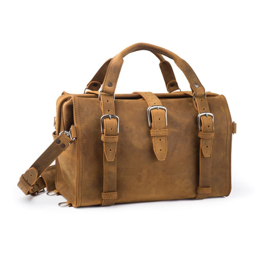This is a tan brown overnight leather duffle bag with a gladstone closure from the front view.