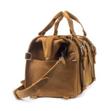 This is the tan brown leather overnight duffle bag from the side.