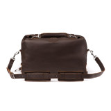 This is a dark brown leather duffle bag with three straps on the front but not showing. This overnight bag has no straps on the back.