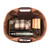 This tan brown leather duffle bag is open and it shows that it holds a whole lot of stuff.