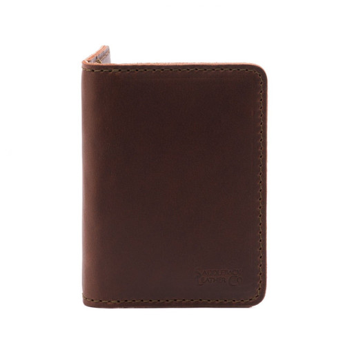 This is a thin red brown leather wallet front.