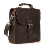 This is a dark brown leather satchel man bag from the side.