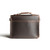 This is the back side of a dark brown leather satchel with a front pocket.