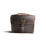 This is the front side of a dark brown leather satchel with a front pocket.