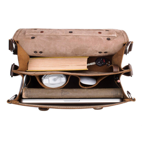 This is a top view of the full grain leather briefcase with the flap open to see what it can hold. The lining is tan.
