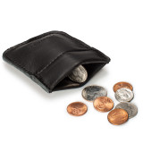 This is a black leather coin purse that has change spilling out in front of the pouch.