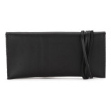 This is a black leather wallet bag with a wrap around it to close it from the back.