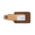 This is a tan brown leather luggage tag that is open to  be an ID Badge Holder.