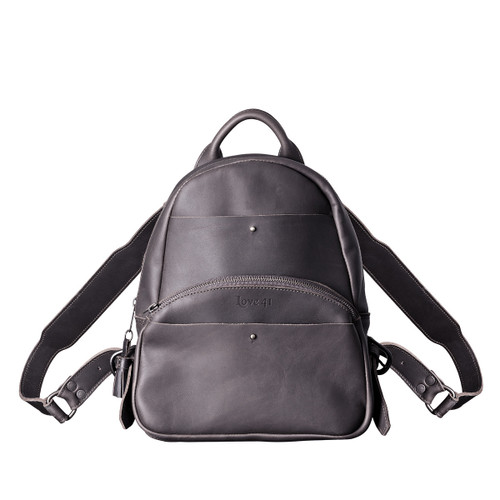 This is a black women's leather backpack from the front side.