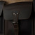 This is a leather trunk that will be a vintage antique one day in a museum. This is one of the three pockets on the inside. It is a dark brown steamer trunk that was old time luggage back in the day on trains and ships.
