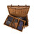 This is a leather trunk that will be a vintage antique one day in a museum. This is the back of the luggage when the tray is moved. It is a tan brown steamer trunk that was old time luggage back in the day on trains and ships.
