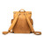 This is the back side of a tan brown leather backpack with the shoulder pads.