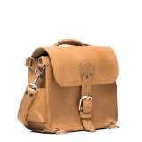 This is the side angle view of a tan brown rounded leather satchel.