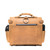 This is the back view  of a tan brown rounded leather satchel.