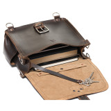 This is the open view of a dark brown rounded leather satchel.