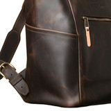This is the side pocket view of the leather all in one backpack in dark coffee
