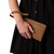 This is the model view of the medium leather wallet in tobacco
