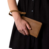This is the model view of the medium leather wallet in tobacco