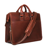 Backside of the red brown leather flight bag briefcase, displaying the shoulder strap and two handles for easy carry. Made by Saddleback