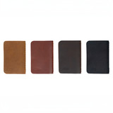 All 4 of the leather pocket notebooks side by side in the colors tobacco, chestnut, dcb, and black. Made by Saddleback