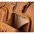 Close-up front deep pocket view of Saddleback Leather's Deep Pocket Leather Duffle Bag in Tan Brown / Tobacco