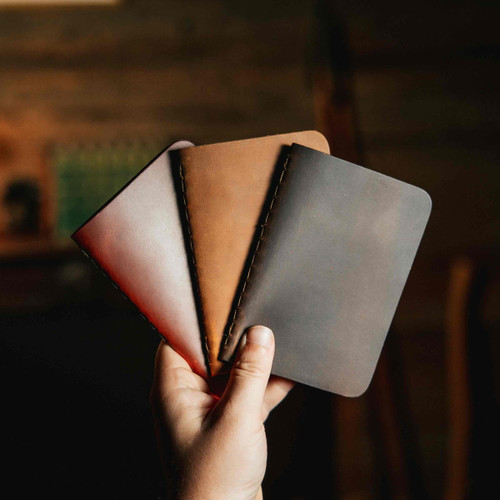 Saddleback Leather Pocket Notebooks in Dark Brown, Tobacco, and Chestnut.