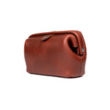 Angled view of leather organizer bag with Gladstone closure