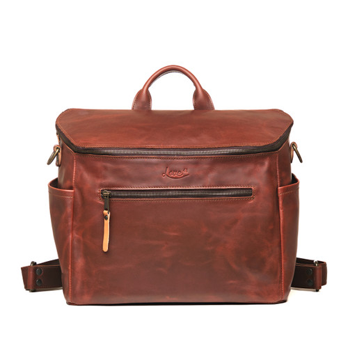 The front of the chestnut colored bag