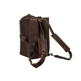 Dark coffee brown colored overnight bag in backpack mode. Made by Saddleback