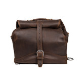 Front of the dark coffee brown over night bag with top rolled down and buckled shut. Made by Saddleback