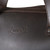This is an up close look at the logo in dark coffee