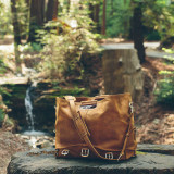 tobacco tan leather waterbag that is perfect for travel and outdoor adventures. Made by Saddleback