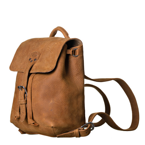 Front of the tobacco tumbled leather 12" drawstring backpack closed. Made by Saddleback