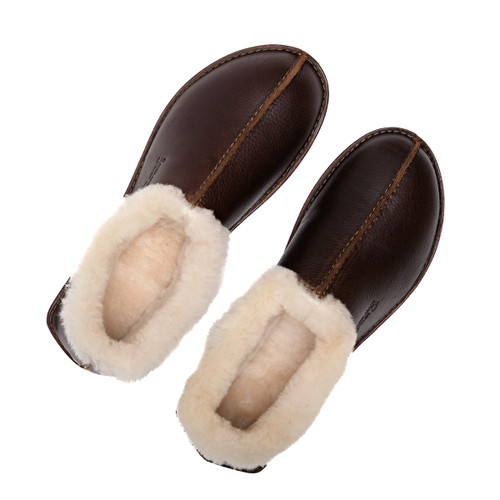 These are the dark coffee brown leather sheepskin mocassins showing the overall shape and crease down the center better. Made by Saddleback